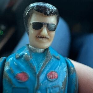 Cast iron Richard pettyAction Figure with Blue Outfit and Sunglasses